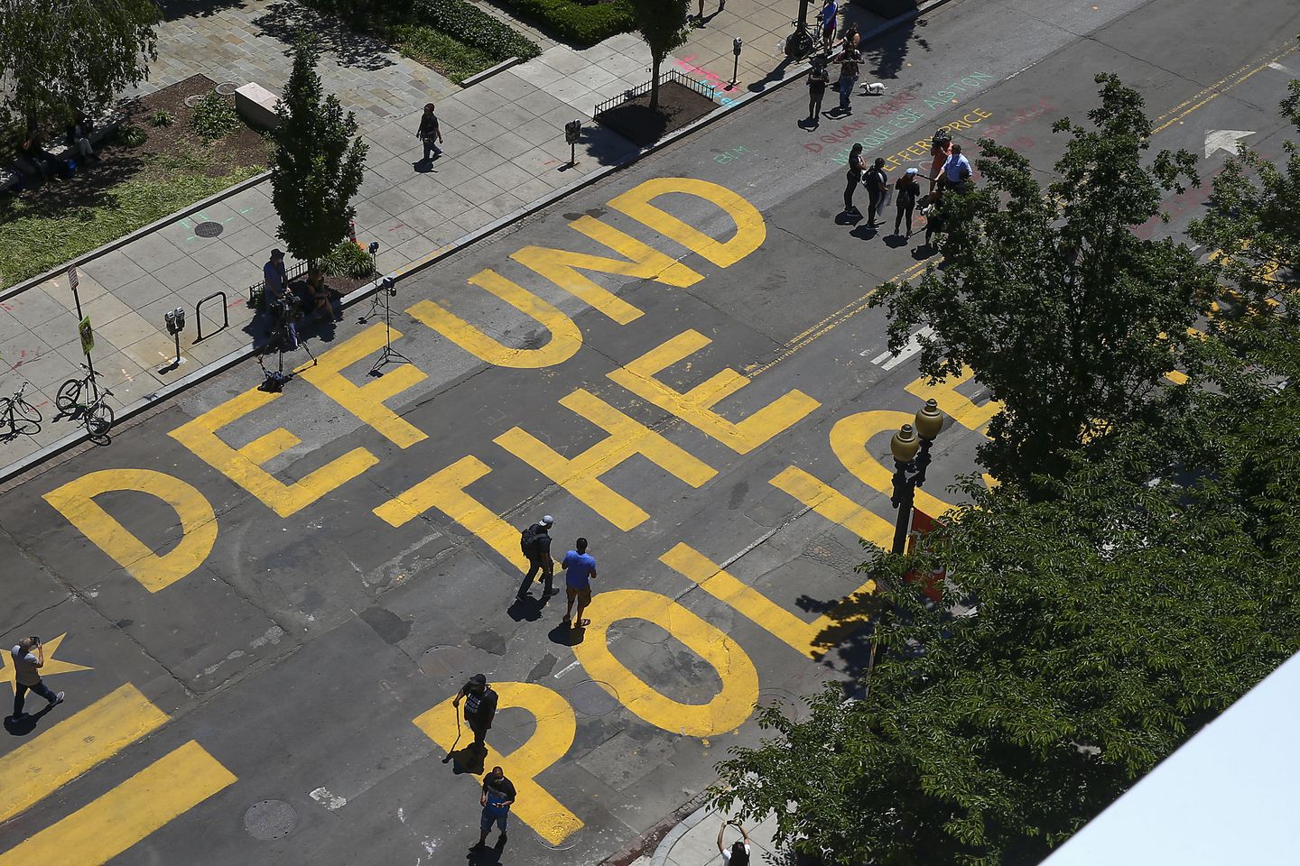Defund the Police, painted in yellow on the street in Washington, DC